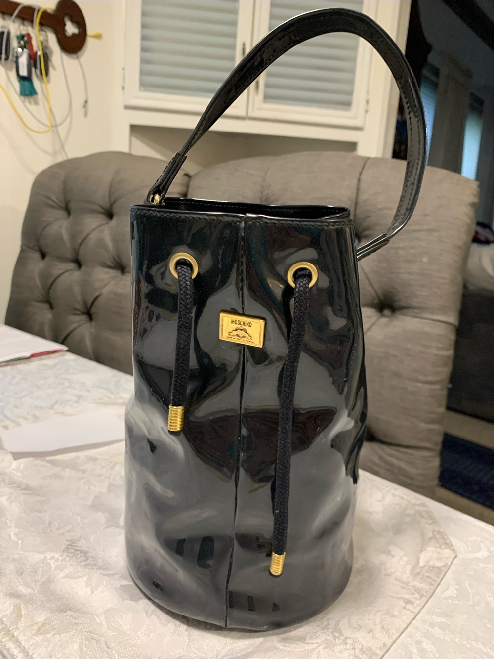 Moschino Black Patent Leather Drawstring Satchel with Gold Hardware